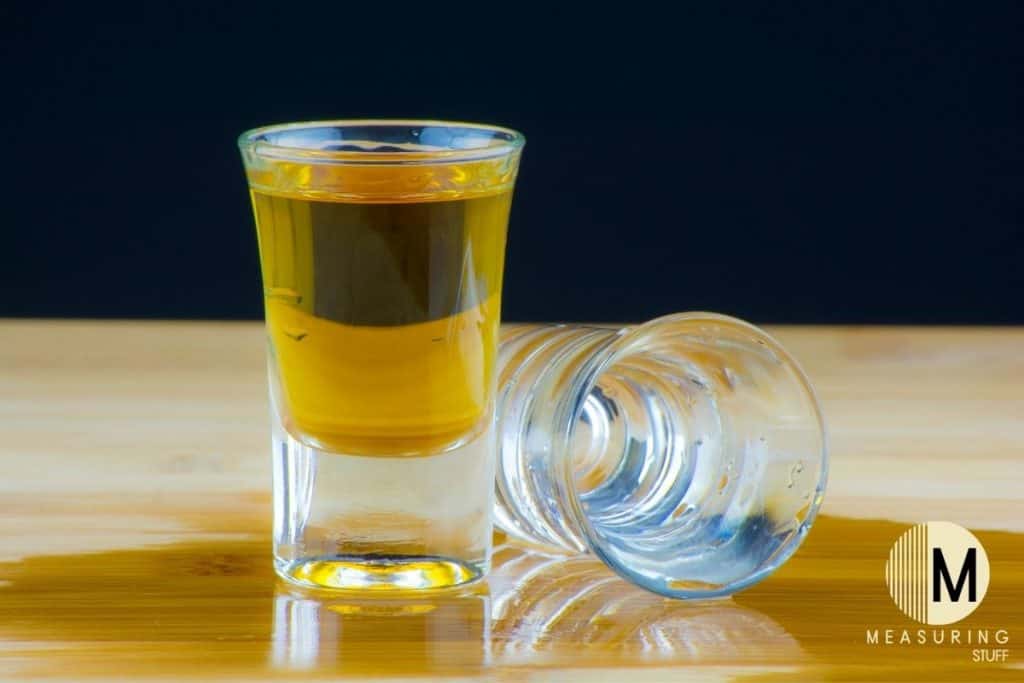 shot glass filled with alcohol