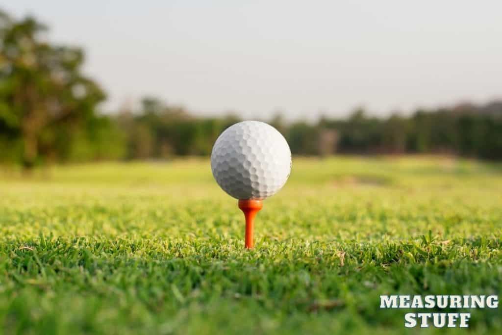 golf ball on red tee