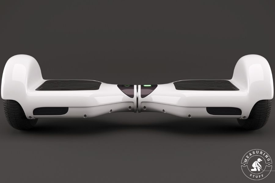 White hoverboard with black padding for feet