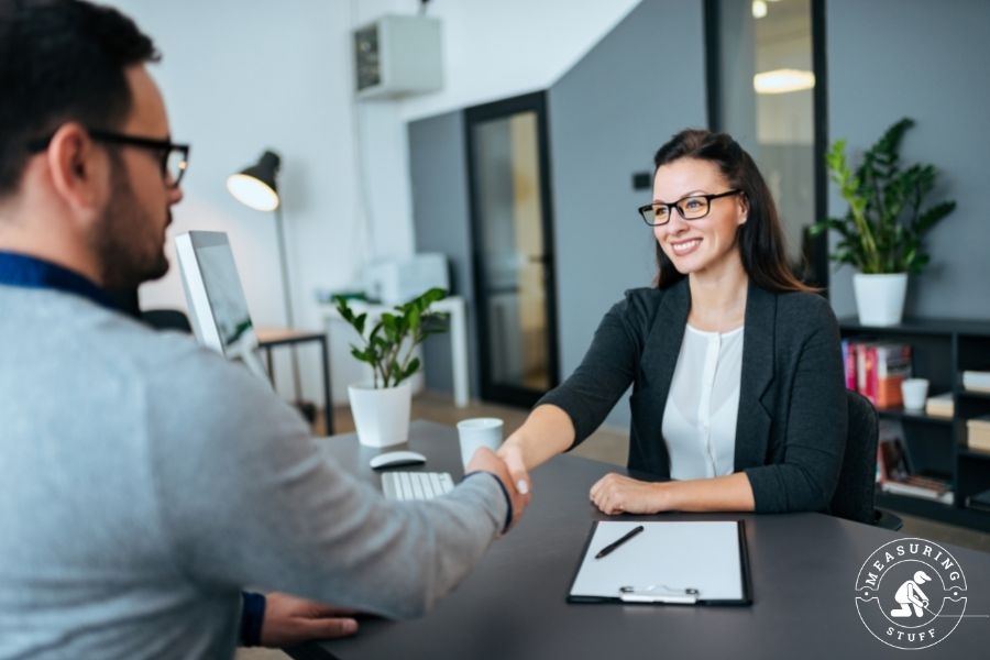 man and woman at job interview