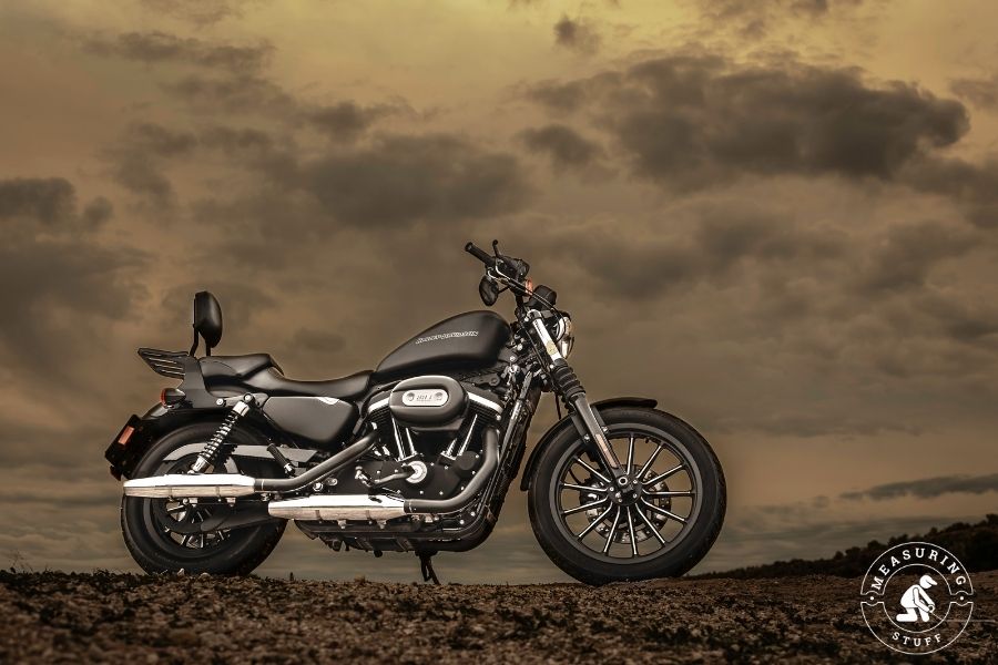 black motorcycle on dirt road