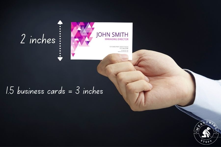 hand holding business card