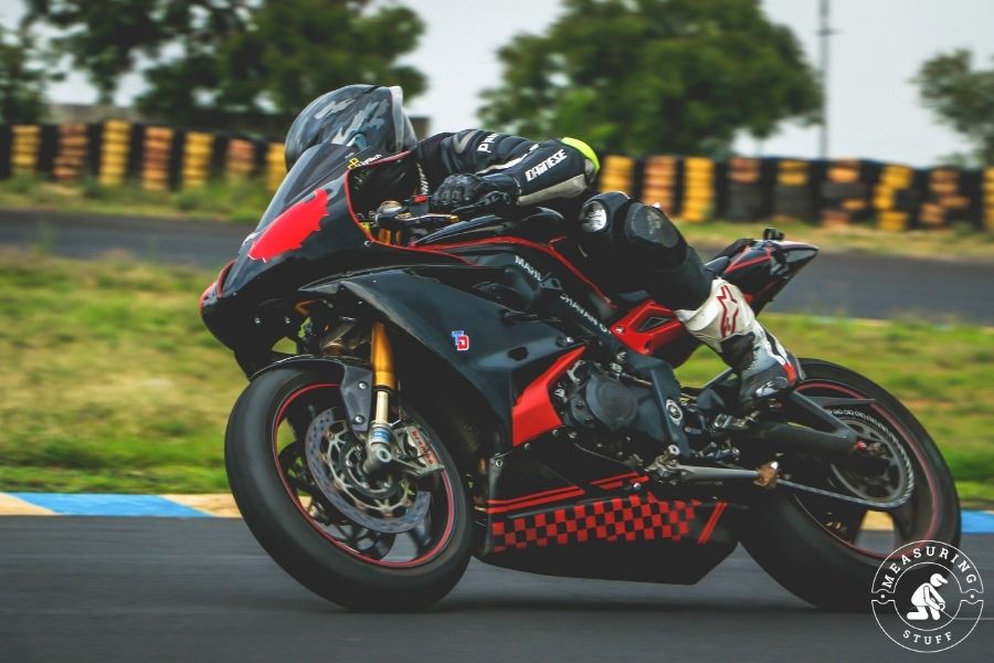 black and red sports bike on race track