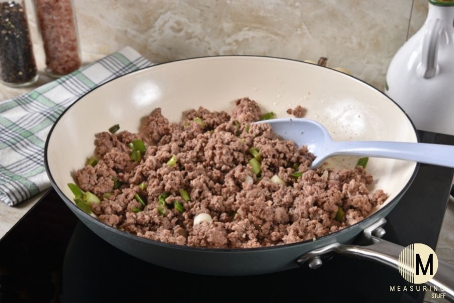 cooked ground beef in pan