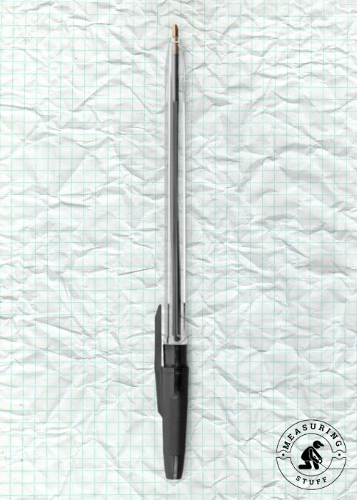 plastic pen with black cap