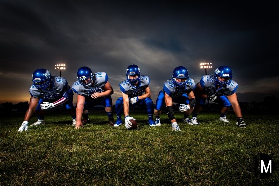 football offensive line players