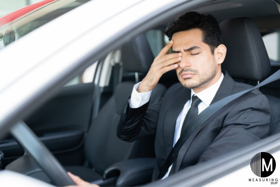tired driver in car