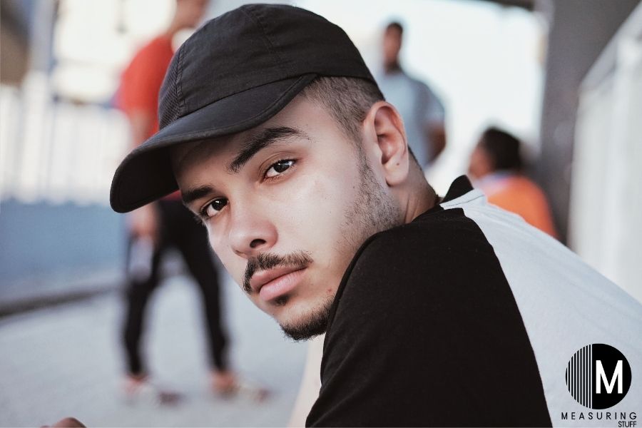 man wearing black cap