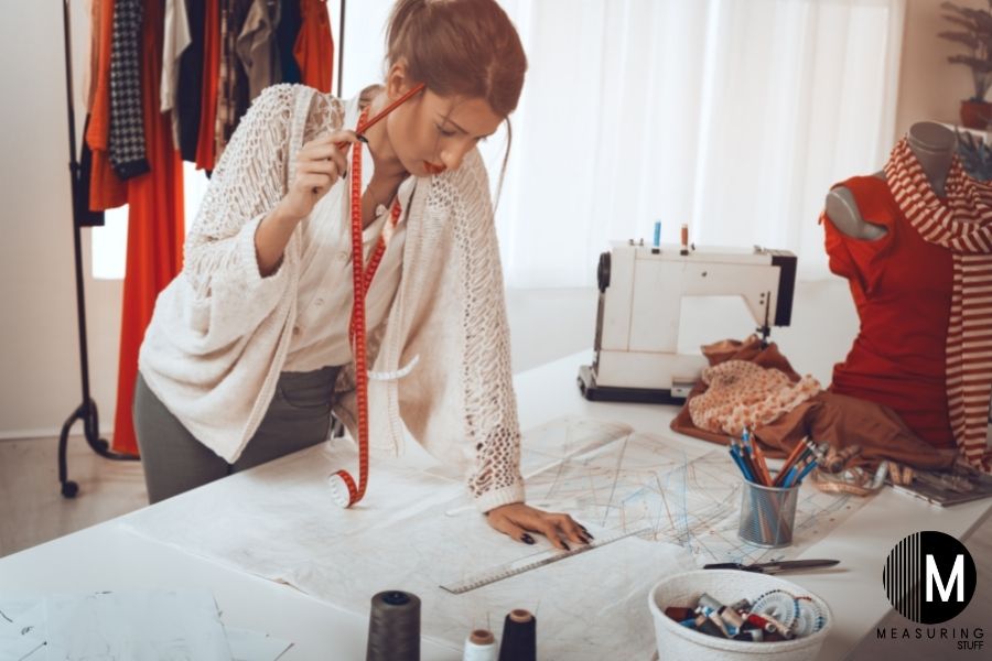 woman with sewing pattern