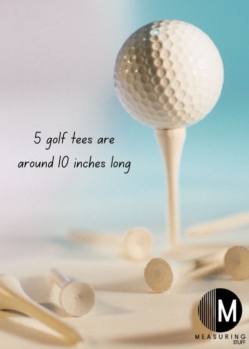 white golf tees and ball