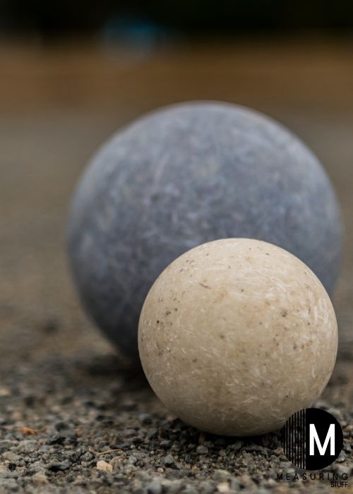 2 different sized bocce balls