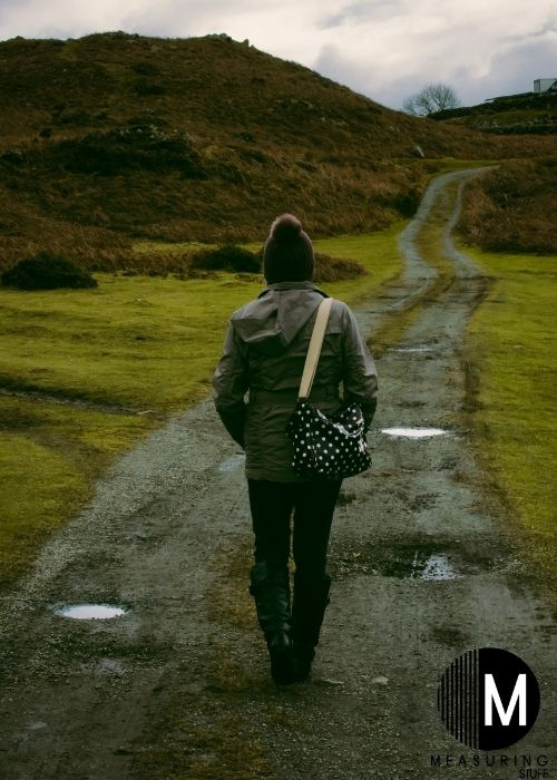 woman walking on trail
