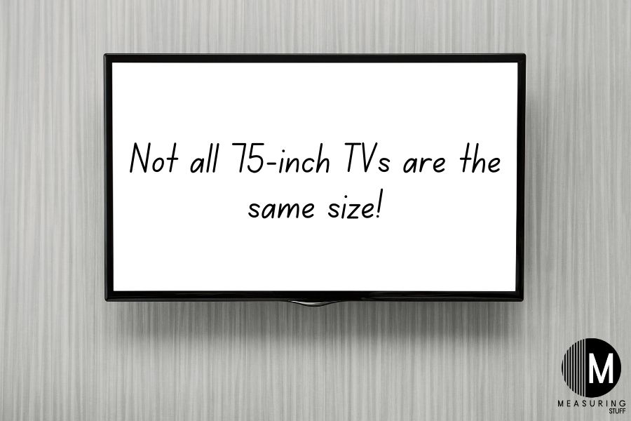 tv mounted on grey wall