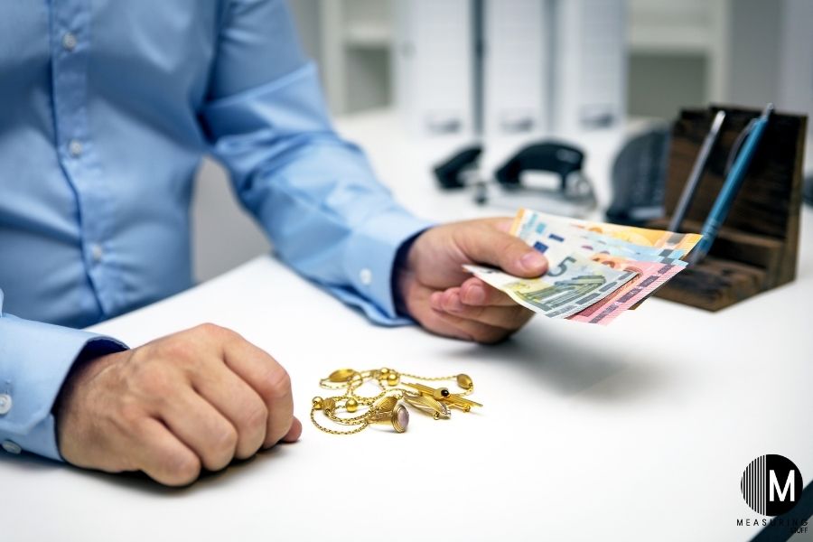 paying money for gold