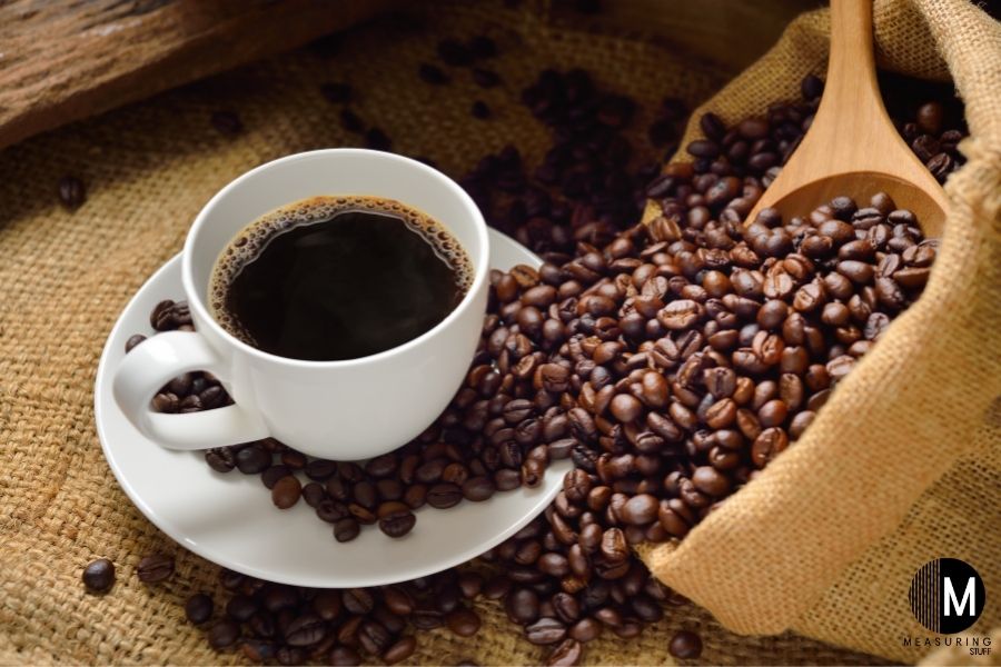 cup of coffee with beans