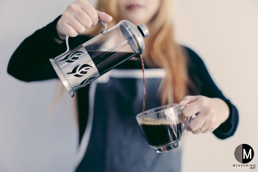 pouring coffee into a cup