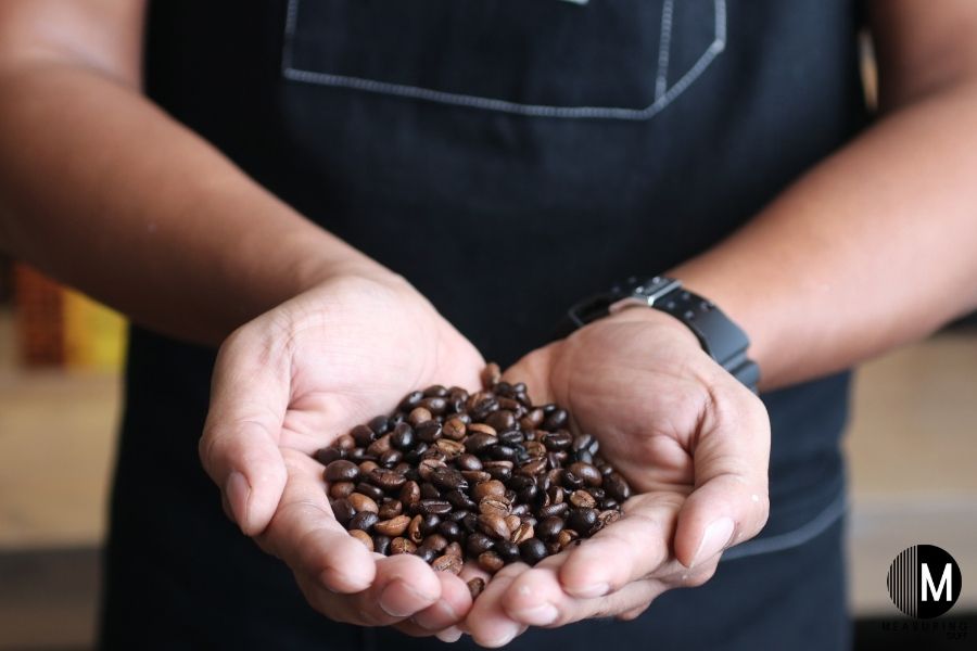 coffee beans in hands
