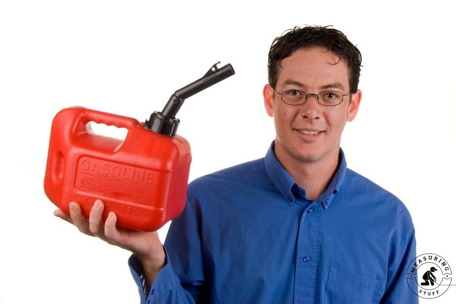 man holding gas can