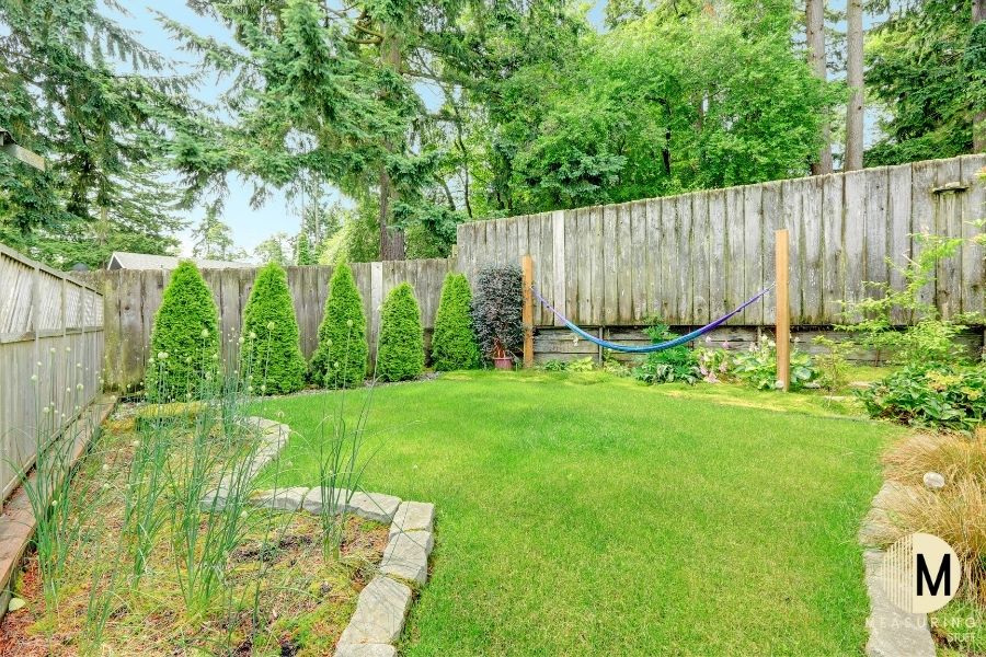 backyard with large fence