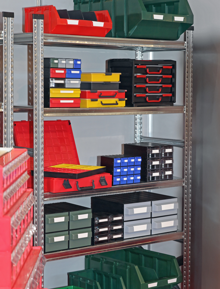 plastic storage bins and trays in garage