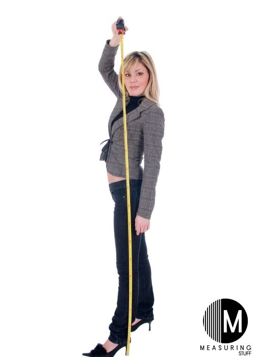 woman measuring height