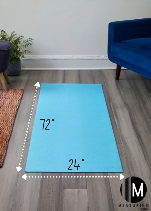 blue yoga mat on wood floor with dimensions