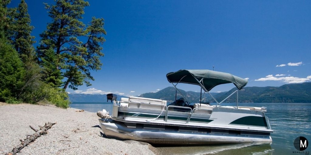 pontoon boat on beach 
