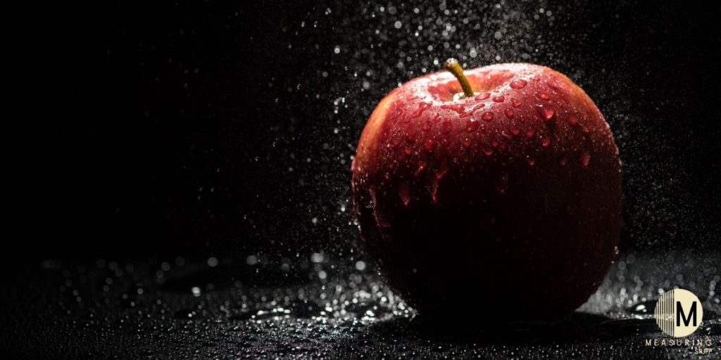 red apple with water