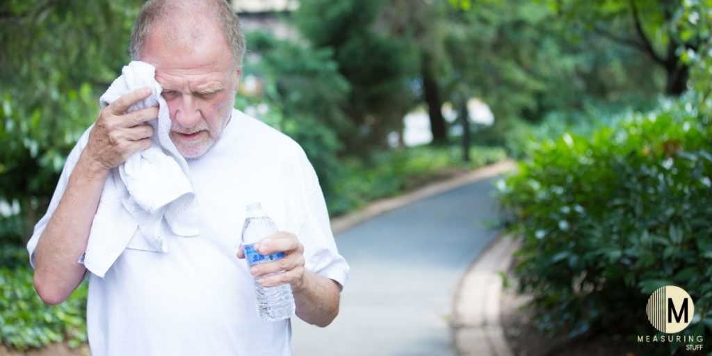 man walking in hot weather