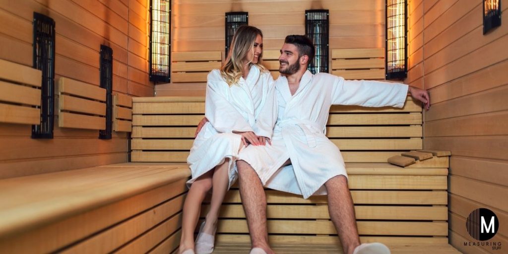 man and woman in sauna