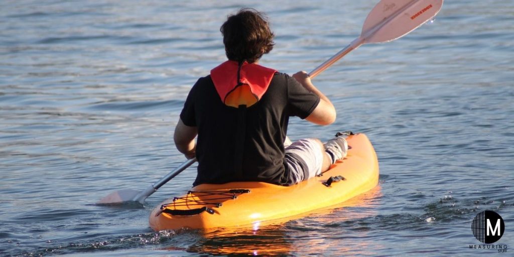 man in yellow kayak