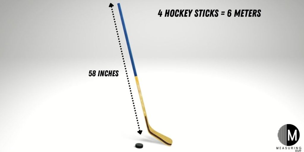 wooden hockey stick and puck