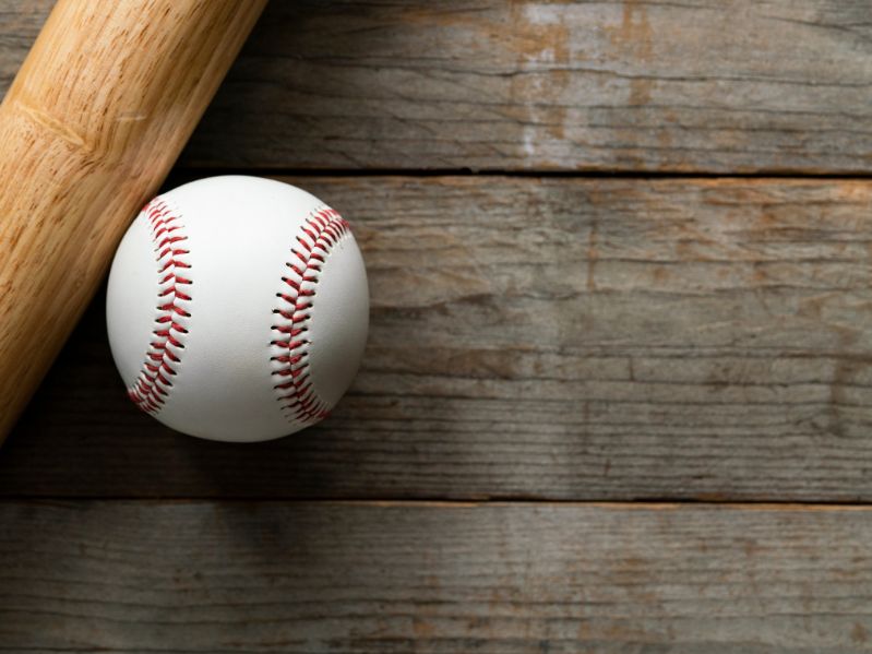 baseball against a wooden wall
