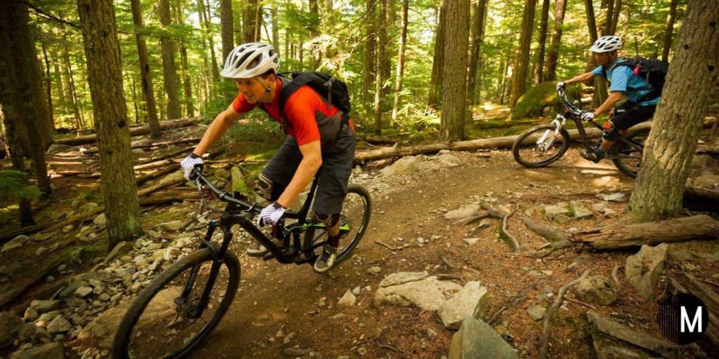 riding mountain bike on trail