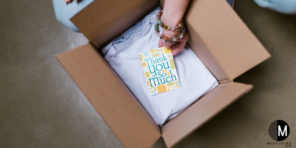 thank you card in a box with tshirts