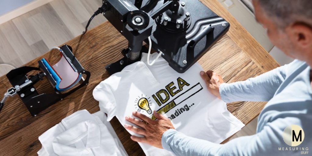 applying logo on white tshirt