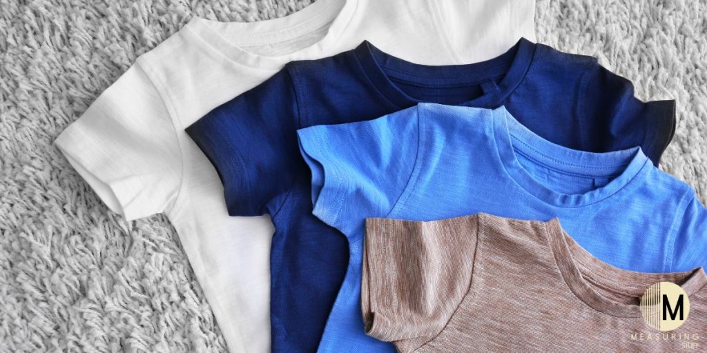 4 tshirts on carpet background