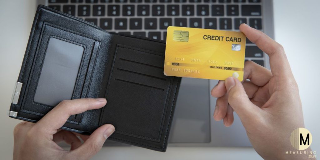 gold credit card and wallet