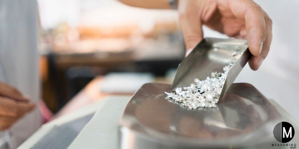 weighing silver on a scale