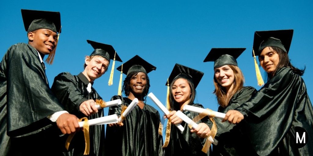 students wearing graduation caps
