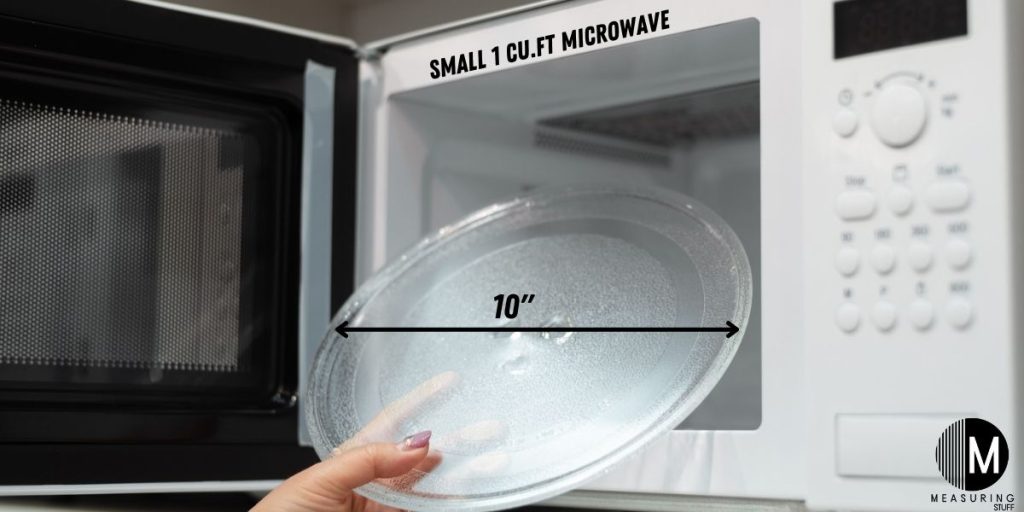 small microwave with glass plate