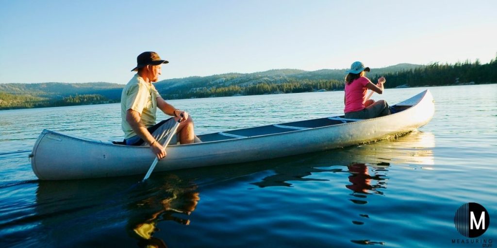 couple paddling in a canoe