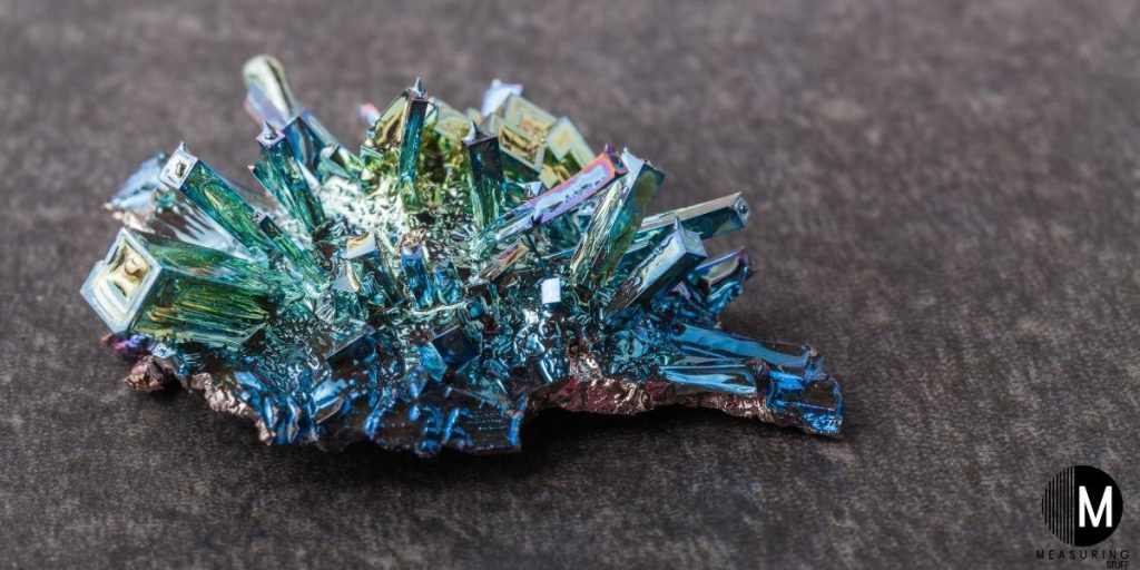 bismuth on dark stone background