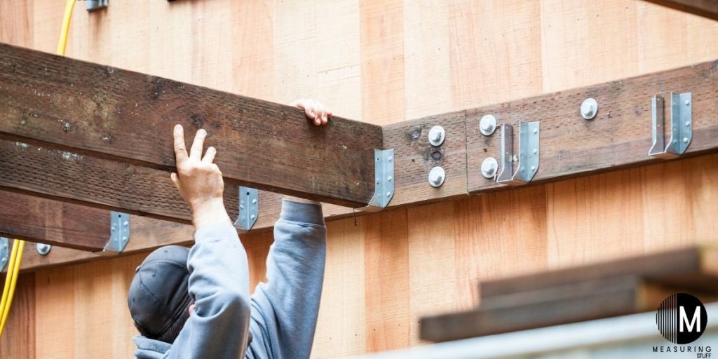 installing deck support beams