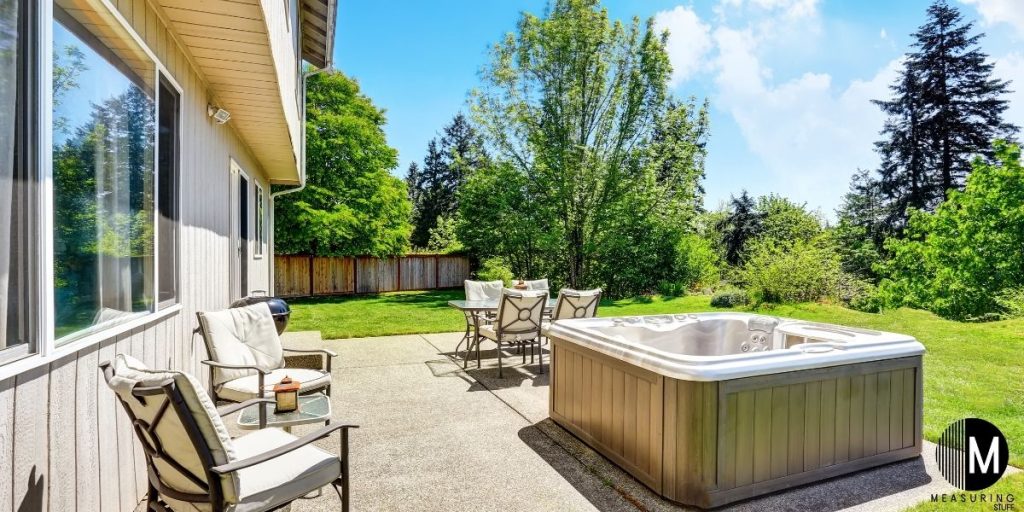 hot tub sitting on concrete slab