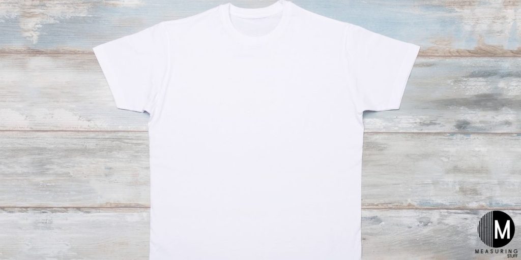 white tshirt on multi colored background