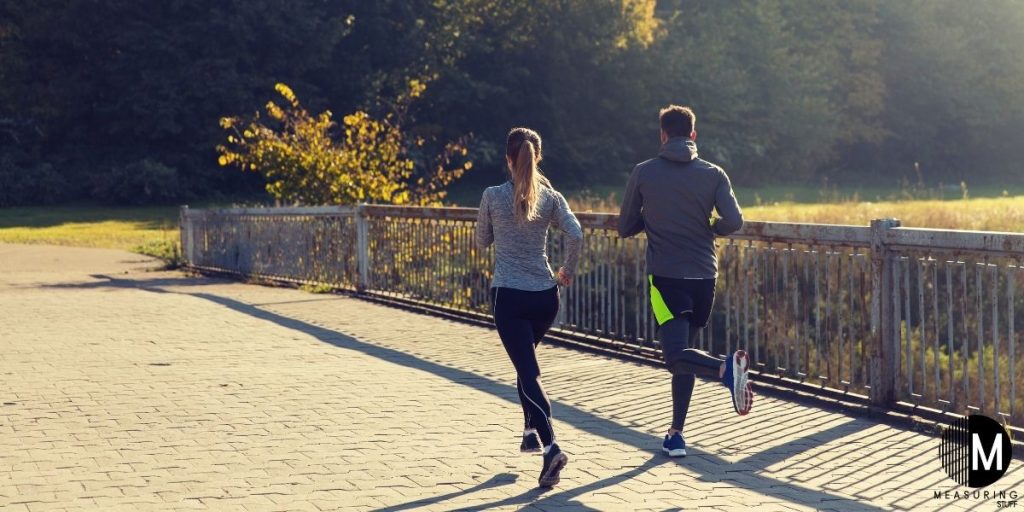 man and woman running