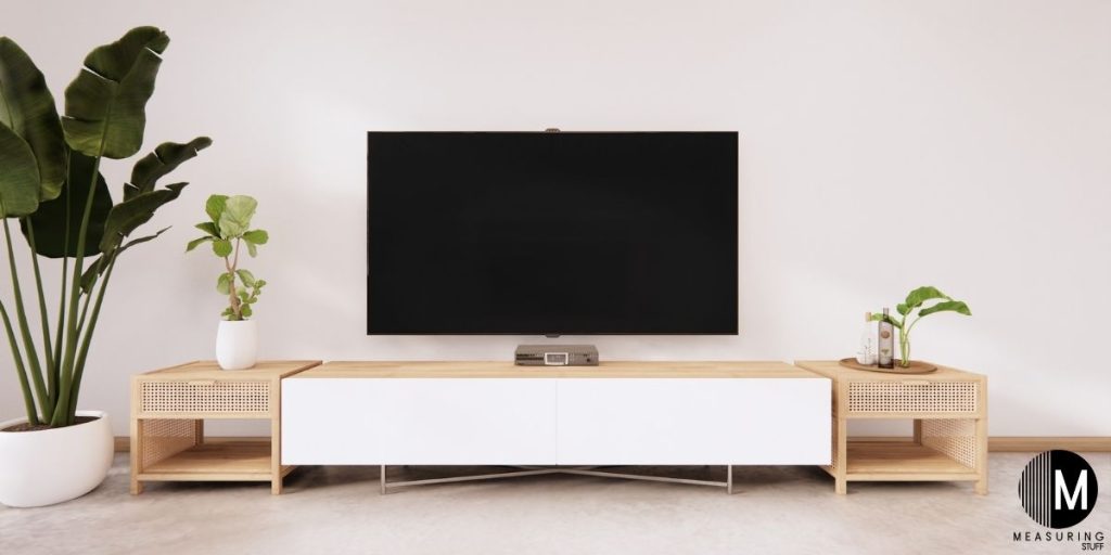 wall mounted tv above stand