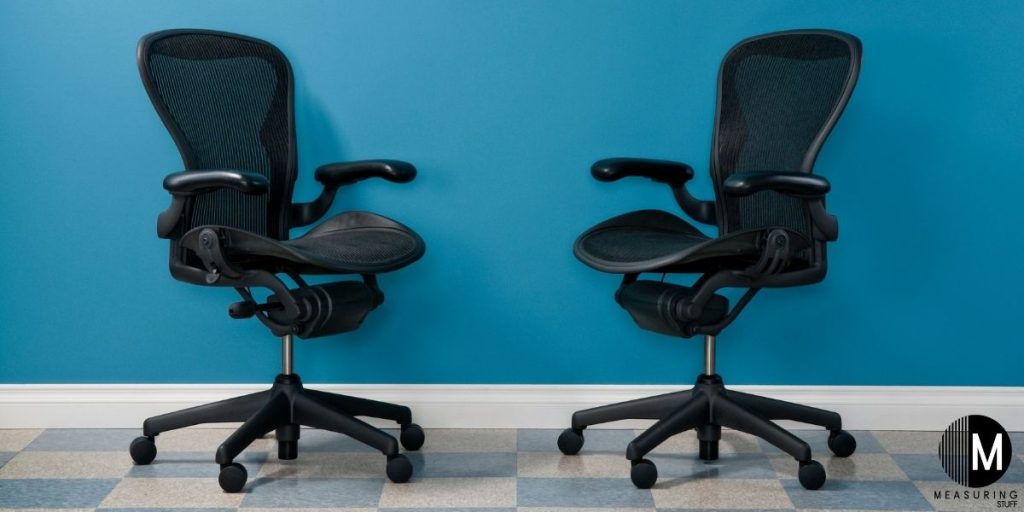 pair of black office chairs