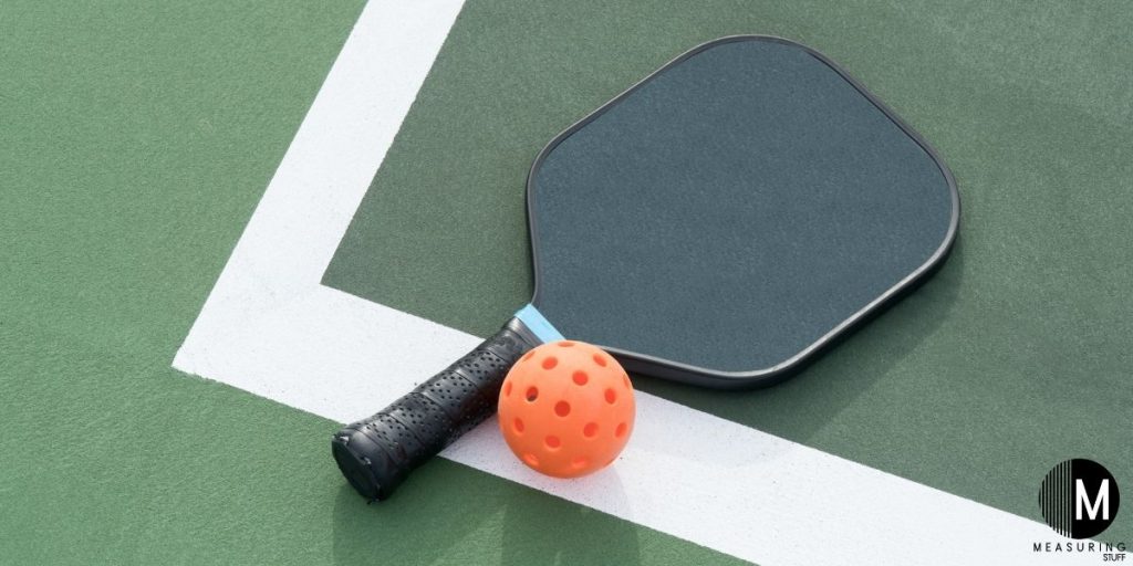 pickleball racket and ball